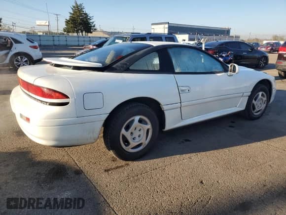1994 Dodge Stealth with VIN JB3AM44H1RY006874, listed as a Copart auction lot 75991164 with 59,310 mi miles and Salvage title. Bid and sale history available at DreamBid. Image 3.