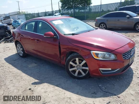 2016 Volvo S60 T5 Drive-E Premier z VIN YV126MFK4G2399463, wystawiony jako IAAI lot #42568556 z przebiegiem 94 972 mil mil oraz . Historia ofert i sprzedaży dostępna na DreamBid. Obrazek 1.
