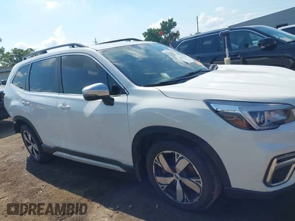 2020 Subaru Forester Touring with VIN JF2SKAXCXLH493203, listed as a IAAI auction lot 42983342 with 109,124 mi miles and . Bid and sale history available at DreamBid. Image 14.