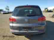 2014 Volkswagen Tiguan SEL z VIN WVGAV3AX0EW555873, wystawiony jako Copart lot #55695955 z przebiegiem 69 984 mil mil oraz Szkoda całkowita • Salvage title. Historia ofert i sprzedaży dostępna na DreamBid. Obrazek 6.