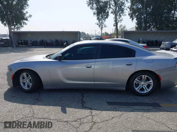 2015 Dodge Charger SE with VIN 2C3CDXBG8FH837060, listed as a IAAI auction lot 43397005 with 102,616 mi miles and . Bid and sale history available at DreamBid. Image 14.