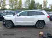 2018 Jeep Grand Cherokee Overland with VIN 1C4RJFCG1JC405736, listed as a IAAI auction lot 43296562 with 91,589 mi miles and . Bid and sale history available at DreamBid. Image 14.