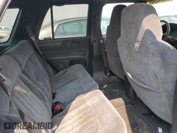 2001 Chevrolet Blazer LT z VIN 1GNDT13W61K226300, wystawiony jako Copart lot #69534994 z przebiegiem Nie podano mil oraz Czysty tytuł • Clean title. Historia ofert i sprzedaży dostępna na DreamBid. Obrazek 10.