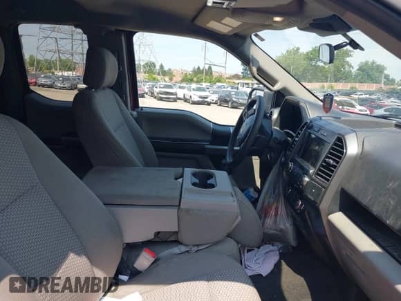 2019 Ford F-150 XL with VIN 1FTFX1E51KFA42323, listed as a IAAI auction lot 42864315 with 216,498 mi miles and . Bid and sale history available at DreamBid. Image 5.