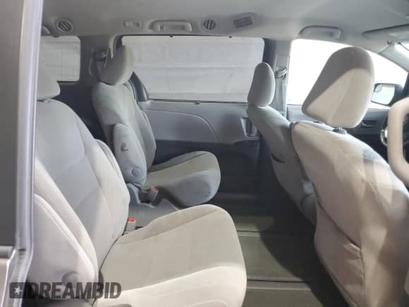 2017 Toyota Sienna LE с VIN 5TDJZ3DC6HS153961, выставлен на аукционе Copart как лот 71467485 с пробегом 135 043 миль миль и Списание • Salvage title. История ставок и продаж доступна на DreamBid. Изображение 11.