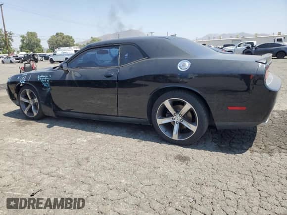 2014 Dodge Challenger R/T Plus with VIN 2C3CDYBT1EH294121, listed as a Copart auction lot 60687575 with 121,607 mi miles and Salvage title. Bid and sale history available at DreamBid. Image 2.