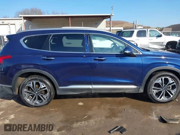 2019 Hyundai Santa Fe Ultimate с VIN 5NMS5CAA6KH117104, выставлен на аукционе IAAI как лот 41639157 с пробегом 75 507 миль миль и . История ставок и продаж доступна на DreamBid. Изображение 13.
