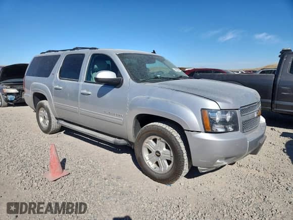 2012 Chevrolet Suburban LT с VIN 1GNSKJE77CR172791, выставлен на аукционе Copart как лот 80507275 с пробегом 180 272 миль миль и Списание • Salvage title. История ставок и продаж доступна на DreamBid. Изображение 4.