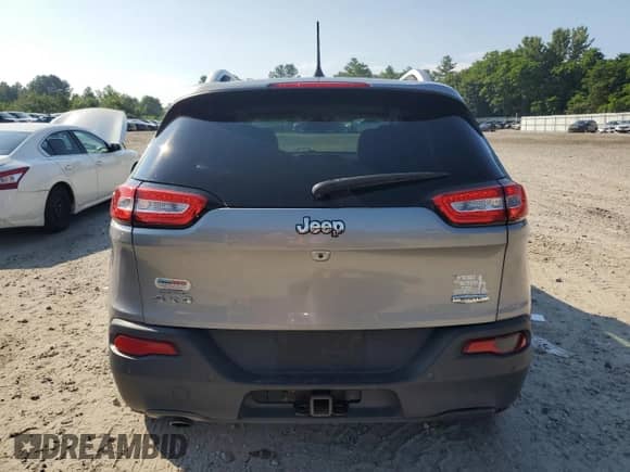 2016 Jeep Cherokee Latitude with VIN 1C4PJMCB2GW100138, listed as a Copart auction lot 64548445 with 211,628 mi miles and Salvage title. Bid and sale history available at DreamBid. Image 6.