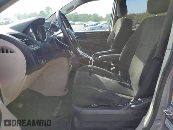 2015 Dodge Grand Caravan American Value with VIN 2C4RDGBG5FR667028, listed as a Copart auction lot 84714815 with 162,470 mi miles and Salvage title. Bid and sale history available at DreamBid. Image 7.