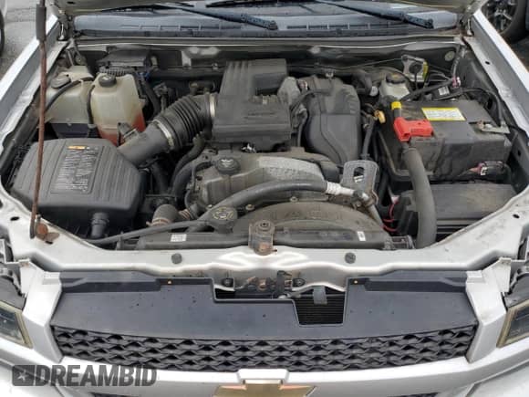 2012 Chevrolet Colorado 1LT с VIN 1GCHTCFE2C8135470, выставлен на аукционе Copart как лот 82033105 с пробегом 151 700 миль миль и Чистый • Clean title. История ставок и продаж доступна на DreamBid. Изображение 11.