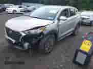 2021 Hyundai Tucson SEL with VIN KM8J3CAL0MU383373, listed as a IAAI auction lot 42731632 with 8,720 mi miles and . Bid and sale history available at DreamBid. Image 2.