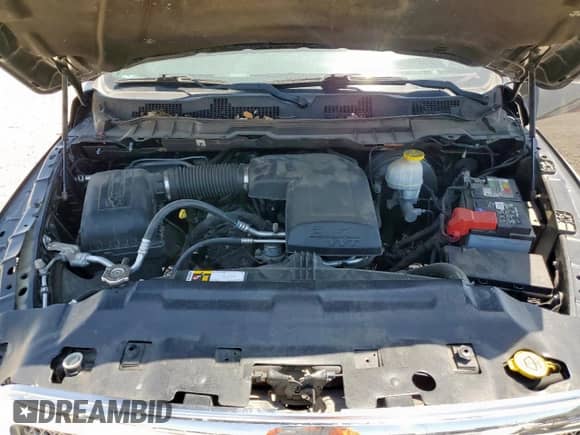 2018 Ram 1500 SLT z VIN 1C6RR6GG2JS234110, wystawiony jako Copart lot #67271245 z przebiegiem 99 170 mil mil oraz Szkoda całkowita • Salvage title. Historia ofert i sprzedaży dostępna na DreamBid. Obrazek 11.