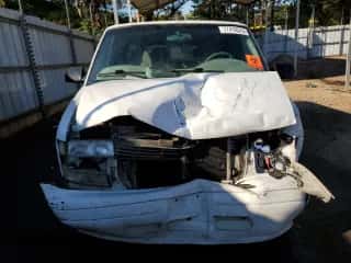 2000 Chevrolet Astro с VIN 1GNDM19W8YB158337, выставлен на аукционе Copart как лот 77418574 с пробегом Не указан миль и Списание • Salvage title. История ставок и продаж доступна на DreamBid. Изображение 5.
