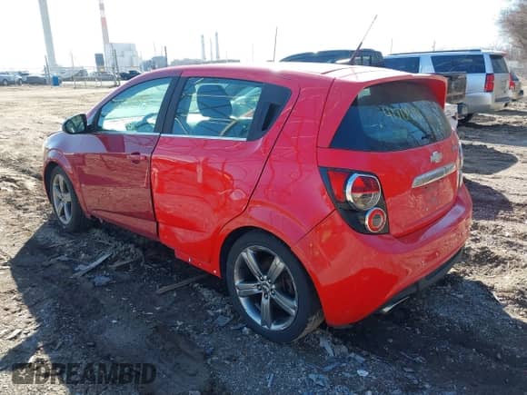 2014 Chevrolet Sonic RS with VIN 1G1JG6SB8E4224403, listed as a IAAI auction lot 41709181 with 156,563 mi miles and . Bid and sale history available at DreamBid. Image 3.