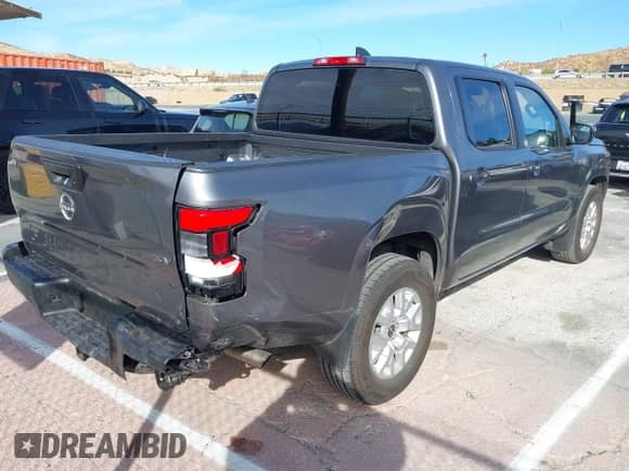 2023 Nissan Frontier SV with VIN 1N6ED1EJXPN659912, listed as a IAAI auction lot 41393027 with 20,745 mi miles and . Bid and sale history available at DreamBid. Image 4.