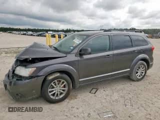 2017 Dodge Journey SXT with VIN 3C4PDCBB8HT677007, listed as a Copart auction lot 66101285 with 117,202 mi miles and Salvage title. Bid and sale history available at DreamBid. Image 1.