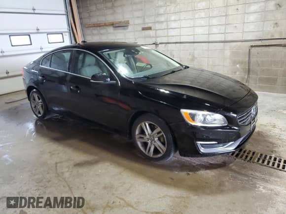 2014 Volvo S60 T5 с VIN YV1612FS4E1292839, выставлен на аукционе Copart как лот 71454085 с пробегом 139 948 миль миль и Списание • Salvage title. История ставок и продаж доступна на DreamBid. Изображение 4.