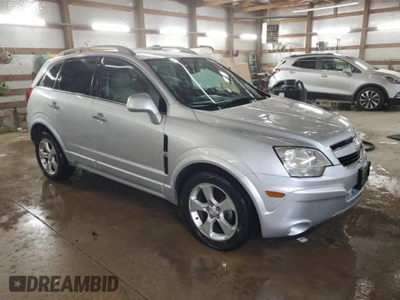 2013 Chevrolet Captiva Sport LTZ с VIN 3GNAL4EK0DS598187, выставлен на аукционе Copart как лот 78989134 с пробегом 107 198 миль миль и Списание • Salvage title. История ставок и продаж доступна на DreamBid. Изображение 4.