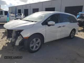 2019 Honda Odyssey EX-L with VIN 5FNRL6H76KB083330, listed as a Copart auction lot 82127835 with 97,880 mi miles and Salvage title. Bid and sale history available at DreamBid. Image 1.