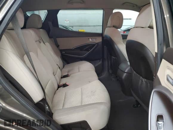 2014 Hyundai Santa Fe z VIN 5XYZTDLB6EG144284, wystawiony jako Copart lot #68639175 z przebiegiem 165 602 mil mil oraz Szkoda całkowita • Salvage title. Historia ofert i sprzedaży dostępna na DreamBid. Obrazek 11.