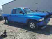 1998 Dodge 1500 z VIN 1B7HC13Z7WJ139829, wystawiony jako Copart lot #69193324 z przebiegiem 145 935 mil mil oraz Szkoda całkowita • Salvage title. Historia ofert i sprzedaży dostępna na DreamBid. Obrazek 4.