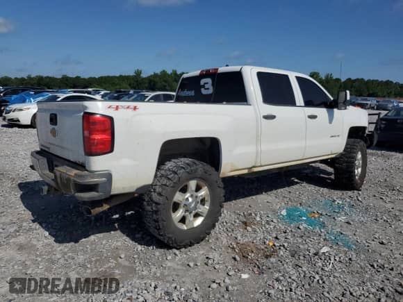 2015 Chevrolet Silverado 2500HD Work Truck z VIN 1GC1KUEG7FF663731, wystawiony jako Copart lot #57123715 z przebiegiem 167 082 mil mil oraz Szkoda całkowita • Salvage title. Historia ofert i sprzedaży dostępna na DreamBid. Obrazek 3.