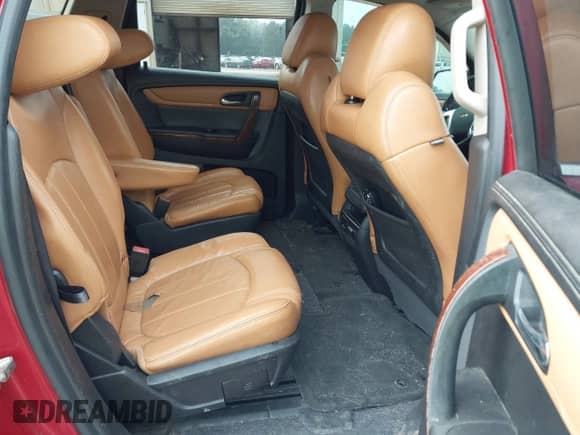 2013 Chevrolet Traverse LTZ z VIN 1GNKVLKD1DJ100904, wystawiony jako IAAI lot #43134807 z przebiegiem 197 188 mil mil oraz . Historia ofert i sprzedaży dostępna na DreamBid. Obrazek 8.