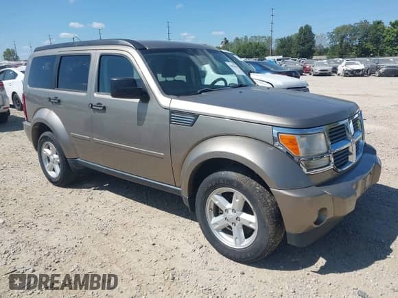 2007 Dodge Nitro SLT with VIN 1D8GU58K27W612800, listed as a IAAI auction lot 43081829 with 98,319 mi miles and . Bid and sale history available at DreamBid. Image 1.