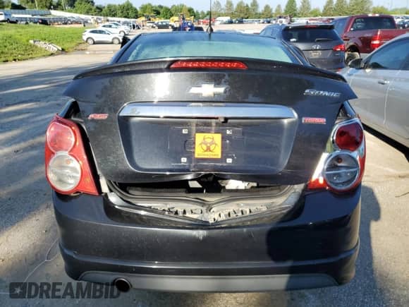 2014 Chevrolet Sonic RS с VIN 1G1JG5SB3E4193698, выставлен на аукционе Copart как лот 62303874 с пробегом 90 870 миль миль и Списание • Salvage title. История ставок и продаж доступна на DreamBid. Изображение 6.