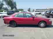 1994 Toyota Camry LE z VIN 4T1SK12E3RU361550, wystawiony jako IAAI lot #42975482 z przebiegiem 182 006 mil mil oraz . Historia ofert i sprzedaży dostępna na DreamBid. Obrazek 13.