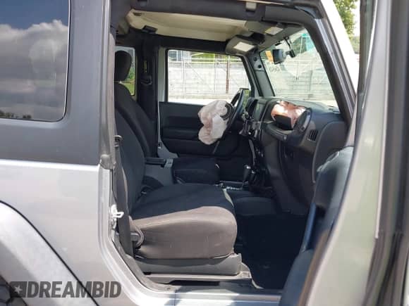 2015 Jeep Wrangler Sport with VIN 1C4AJWAG2FL507778, listed as a IAAI auction lot 42665428 with 126,554 mi miles and . Bid and sale history available at DreamBid. Image 5.