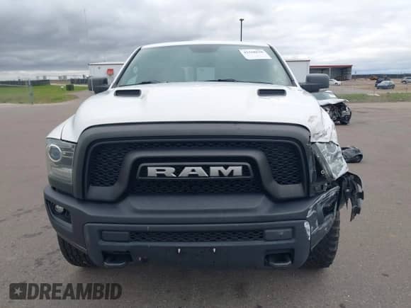 2018 Ram 1500 Rebel with VIN 1C6RR7YT8JS150942, listed as a IAAI auction lot 42168638 with 99,060 mi miles and . Bid and sale history available at DreamBid. Image 12.