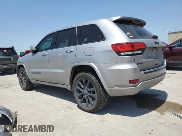 2018 Jeep Grand Cherokee Laredo with VIN 1C4RJFAG4JC272683, listed as a Copart auction lot 56823455 with 122,778 mi miles and Salvage title. Bid and sale history available at DreamBid. Image 2.