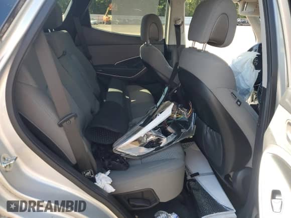 2015 Hyundai Santa Fe z VIN 5XYZTDLB7FG301905, wystawiony jako Copart lot #70538585 z przebiegiem 76 277 mil mil oraz Szkoda całkowita • Salvage title. Historia ofert i sprzedaży dostępna na DreamBid. Obrazek 11.