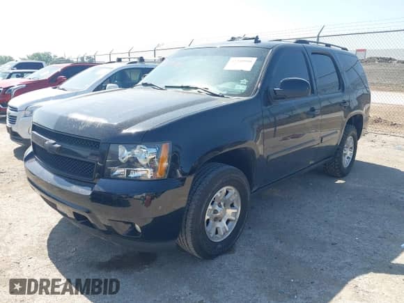 2007 Chevrolet Tahoe LTZ with VIN 1GNFC13047R286757, listed as a IAAI auction lot 42318990 with 240,729 mi miles and . Bid and sale history available at DreamBid. Image 2.