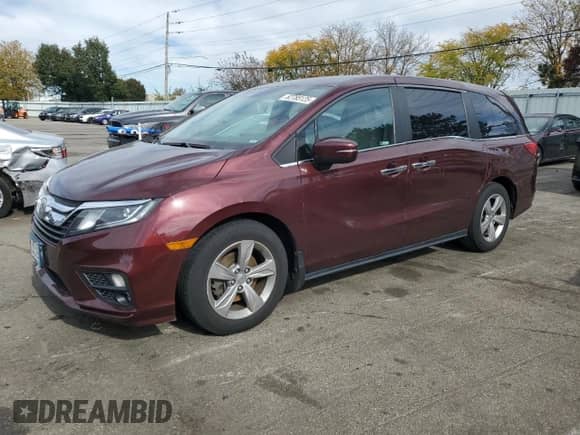 2018 Honda Odyssey EX with VIN 5FNRL6H58JB094388, listed as a Copart auction lot 82785125 with 91,850 mi miles and Salvage title. Bid and sale history available at DreamBid. Image 1.