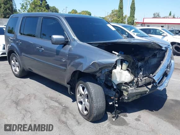 2013 Honda Pilot EX-L with VIN 5FNYF4H57DB020214, listed as a IAAI auction lot 43086404 with 96,173 mi miles and . Bid and sale history available at DreamBid. Image 1.