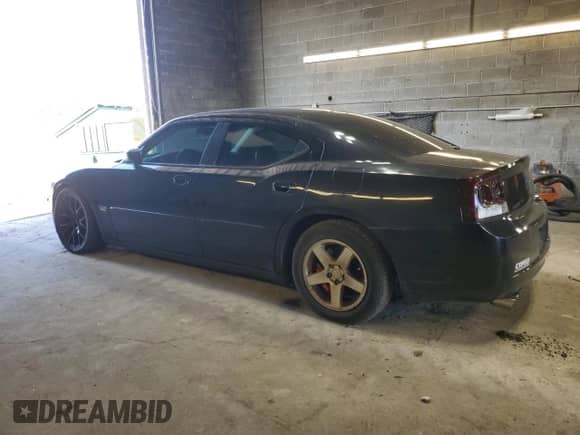 2006 Dodge Charger SRT-8 с VIN 2B3KA73WX6H335481, выставлен на аукционе Copart как лот 58695005 с пробегом 160 306 миль миль и Списание • Salvage title. История ставок и продаж доступна на DreamBid. Изображение 2.