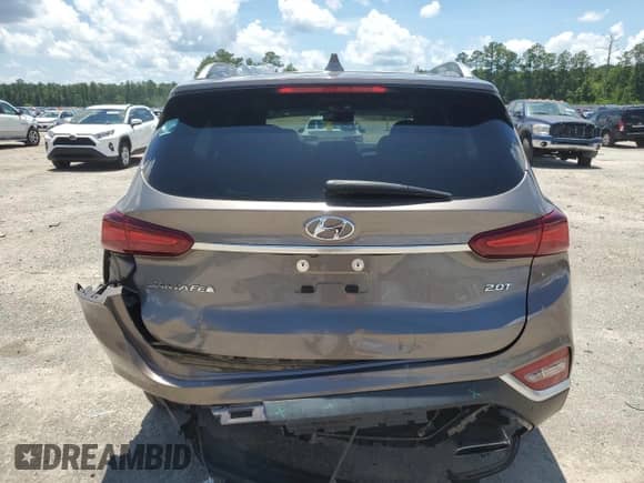 2019 Hyundai Santa Fe Limited z VIN 5NMS53AA8KH059660, wystawiony jako Copart lot #60108985 z przebiegiem 76 093 mil mil oraz Szkoda całkowita • Salvage title. Historia ofert i sprzedaży dostępna na DreamBid. Obrazek 6.