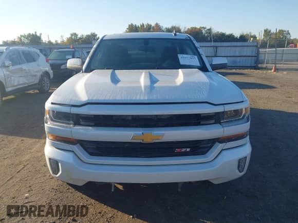 2016 Chevrolet Silverado 1500 LT z VIN 3GCUKREC5GG276375, wystawiony jako IAAI lot #43577857 z przebiegiem 125 238 mil mil oraz . Historia ofert i sprzedaży dostępna na DreamBid. Obrazek 12.