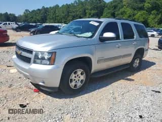 2014 Chevrolet Tahoe LT with VIN 1GNSCBE03ER212227, listed as a Copart auction lot 66442275 with 180,881 mi miles and Salvage title. Bid and sale history available at DreamBid. Image 1.