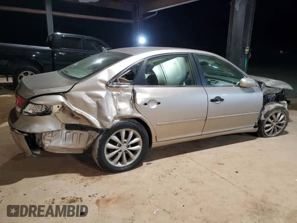 2006 Hyundai Azera SE z VIN KMHFC46F86A128070, wystawiony jako Copart lot #88057915 z przebiegiem Nie podano mil oraz Szkoda całkowita • Salvage title. Historia ofert i sprzedaży dostępna na DreamBid. Obrazek 3.