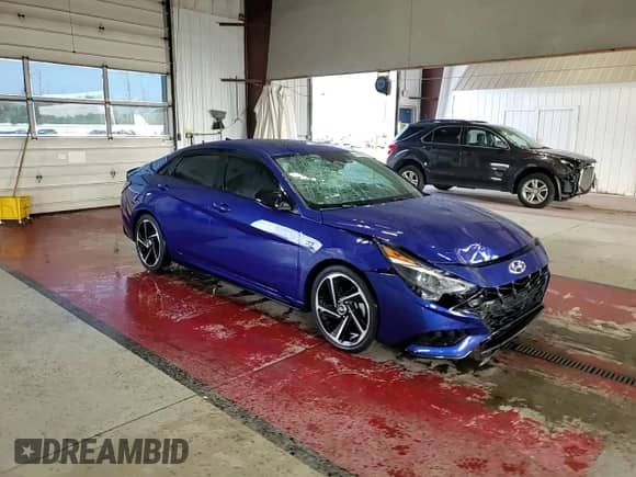 2021 Hyundai Elantra N Line z VIN KMHLR4AF8MU113220, wystawiony jako Copart lot #64006525 z przebiegiem 44 245 mil mil oraz Szkoda całkowita • Salvage title. Historia ofert i sprzedaży dostępna na DreamBid. Obrazek 13.