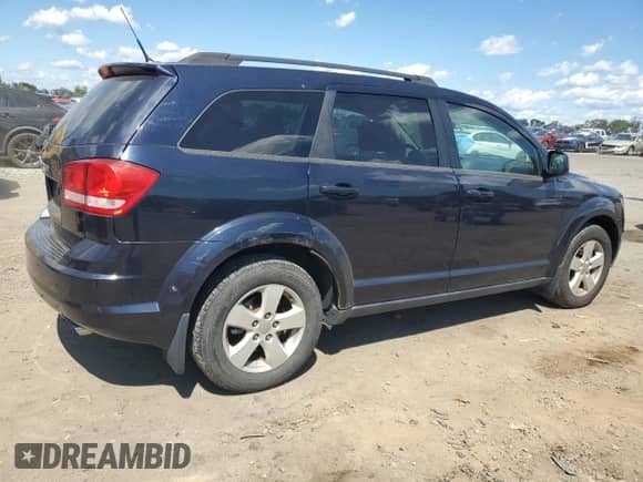2011 Dodge Journey Mainstreet z VIN 3D4PH1FGXBT502377, wystawiony jako Copart lot #70384365 z przebiegiem 191 359 mil mil oraz Czysty tytuł • Clean title. Historia ofert i sprzedaży dostępna na DreamBid. Obrazek 3.