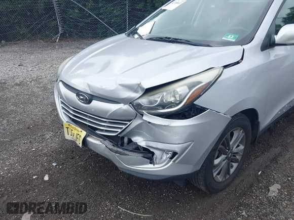 2014 Hyundai Tucson SE with VIN KM8JU3AG5EU831589, listed as a IAAI auction lot 42709097 with 147,199 mi miles and . Bid and sale history available at DreamBid. Image 6.