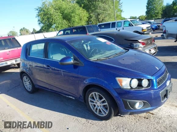 2013 Chevrolet Sonic LT with VIN 1G1JC6SHXD4248345, listed as a IAAI auction lot 42723072 with 128,100 mi miles and . Bid and sale history available at DreamBid. Image 1.