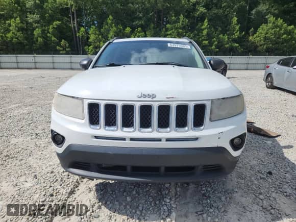 2012 Jeep Compass Limited с VIN 1C4NJCCB9CD548383, выставлен на аукционе Copart как лот 64979365 с пробегом 238 825 миль миль и Списание • Salvage title. История ставок и продаж доступна на DreamBid. Изображение 5.