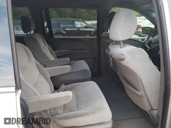 2010 Honda Odyssey LX with VIN 5FNRL3H26AB024960, listed as a Copart auction lot 70644855 with 194,218 mi miles and Salvage title. Bid and sale history available at DreamBid. Image 11.