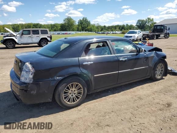 2010 Chrysler 300 Touring с VIN 2C3CA5CV4AH306909, выставлен на аукционе Copart как лот 69995685 с пробегом 203 182 миль миль и Списание • Salvage title. История ставок и продаж доступна на DreamBid. Изображение 3.